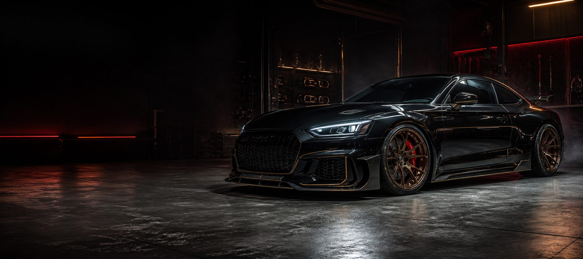 Black customised performance car in a premium workshop